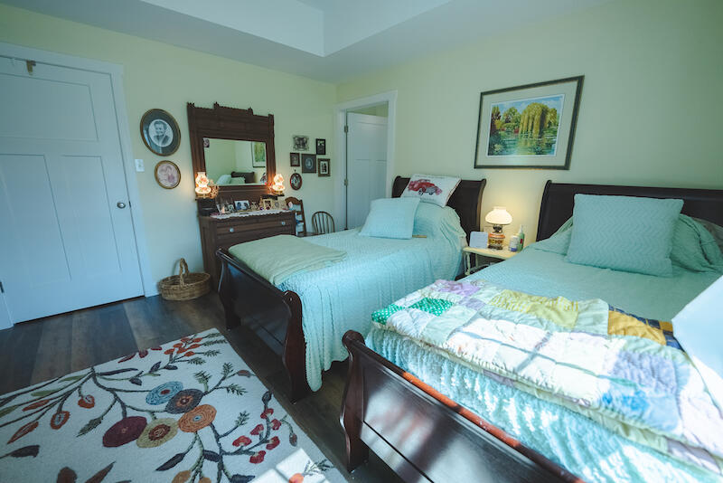 2598 Lone Ivy Road Stuart, VA 24171 - Photo 23 of 26 a bedroom with two beds and painting on the wall