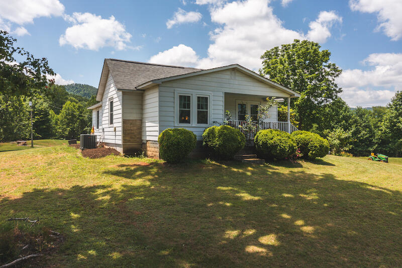 2598 Lone Ivy Road Stuart, VA 24171 - Photo 4 of 26 a view of a house with swimming pool