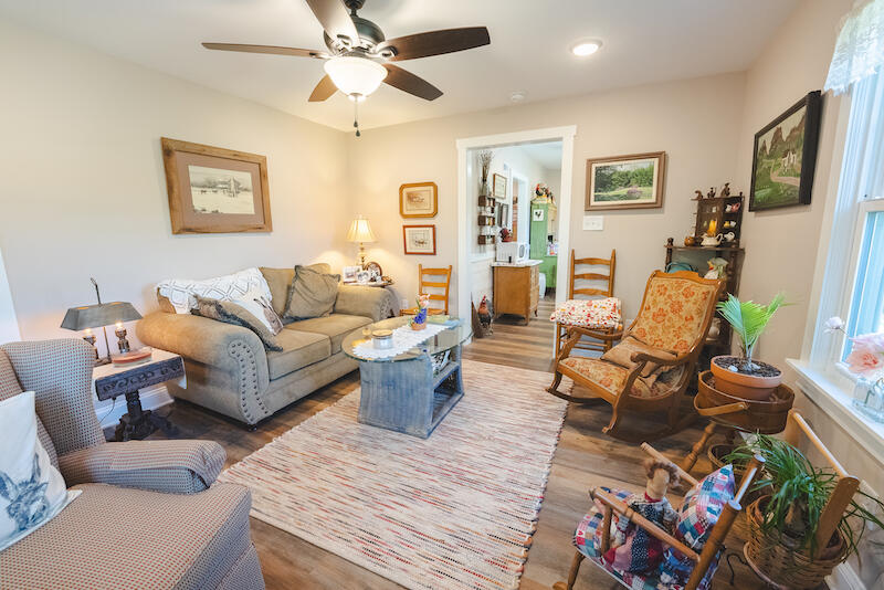 2598 Lone Ivy Road Stuart, VA 24171 - Photo 9 of 26 a living room with furniture and wooden floor