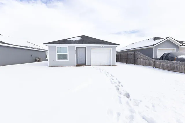 a white house with a outdoor space