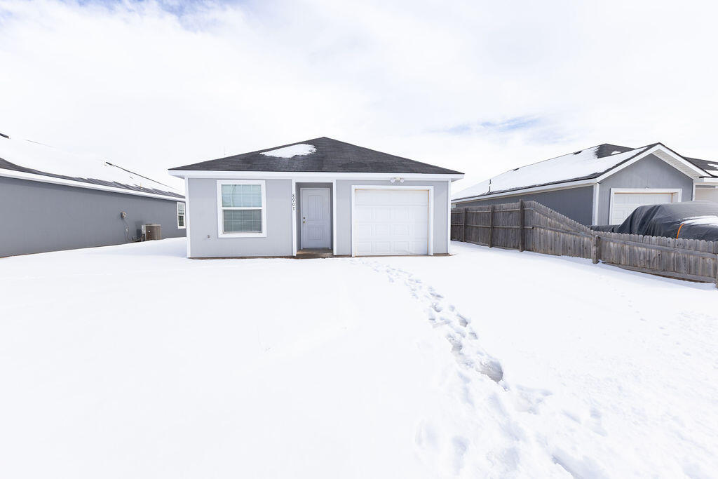 a white house with a outdoor space