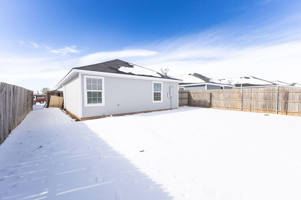 8907 Terrell Avenue Lubbock, TX 79423 - Photo 8 of 8 a view of a house with a outdoor space