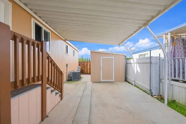 a view of a hallway with staircase