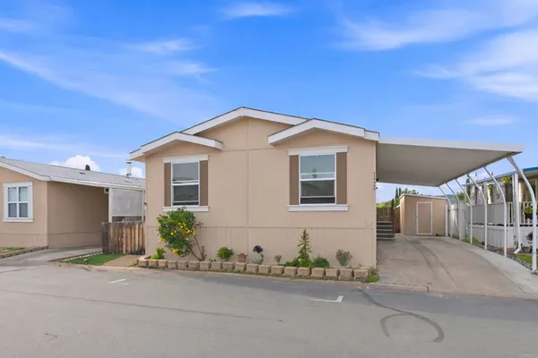 a front view of a house with a garage