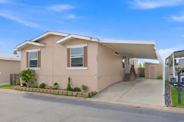a front view of a house with a garage