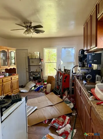 a room with gym equipment and windows