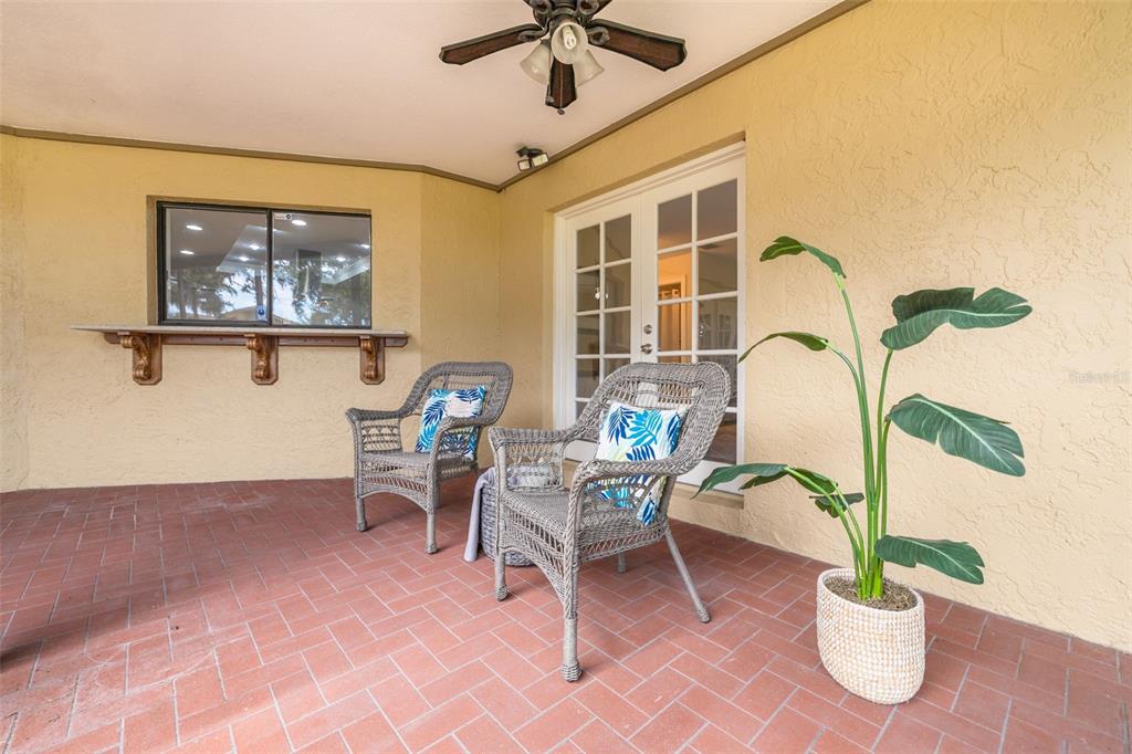 4415 Marine Parkway New Port Richey, FL 34652 - Photo 18 of 61 a workspace with furniture and a potted plant