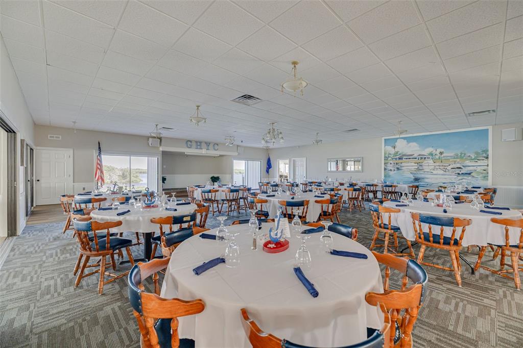 4415 Marine Parkway New Port Richey, FL 34652 - Photo 40 of 61 a view of a dining room with furniture window and outside view