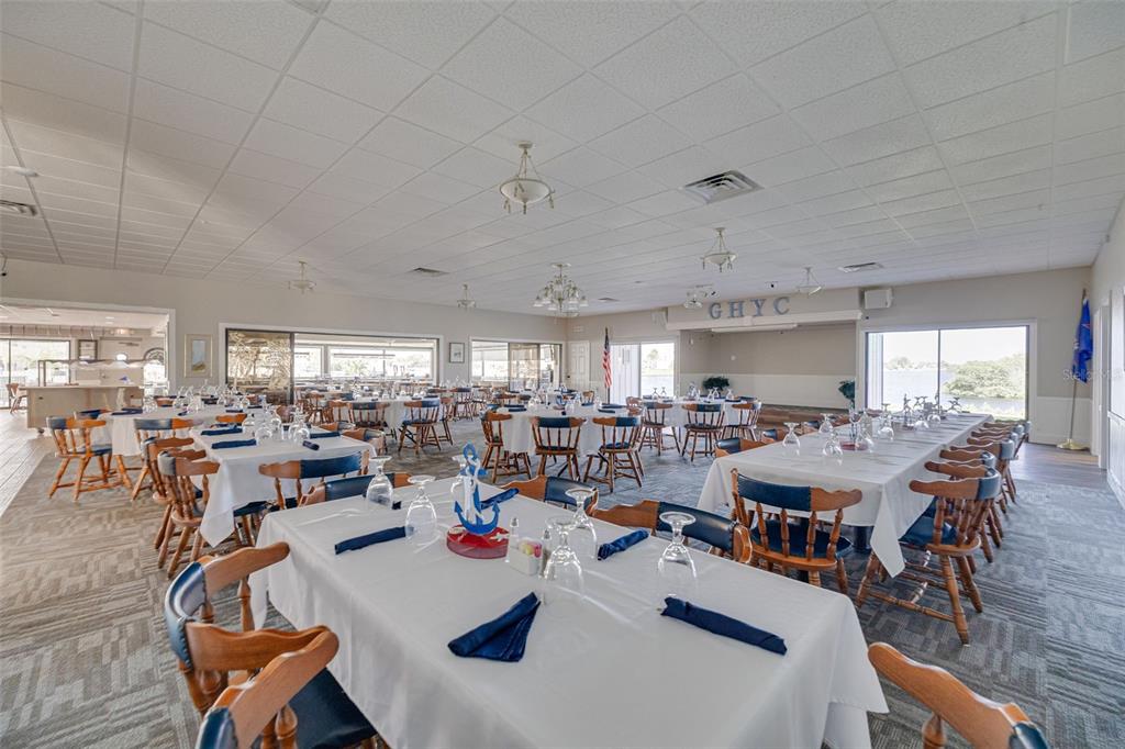 4415 Marine Parkway New Port Richey, FL 34652 - Photo 48 of 72 a view of a dining room with furniture window and outside view