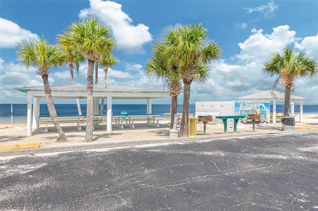 4415 Marine Parkway New Port Richey, FL 34652 - Photo 58 of 72 a front view of a building with palm trees