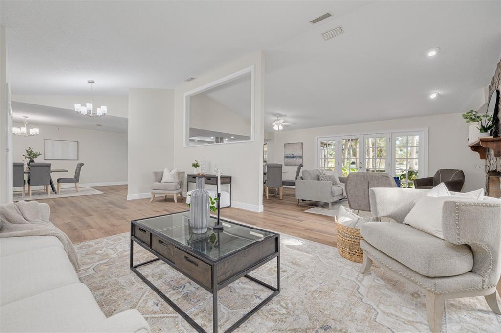 4415 Marine Parkway New Port Richey, FL 34652 - Photo 6 of 61 a living room with furniture and a table