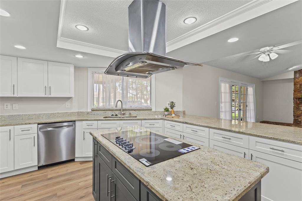 4415 Marine Parkway New Port Richey, FL 34652 - Photo 9 of 72 a kitchen that has a sink a stove and a oven