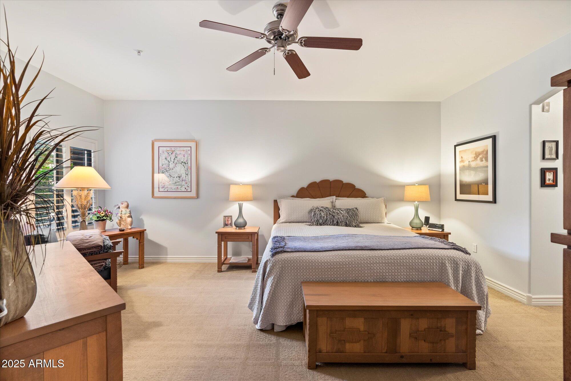 5350 East Deer Valley Drive, Unit 1238 Phoenix, AZ 85054 - Photo 11 of 29 a bedroom with a bed and window