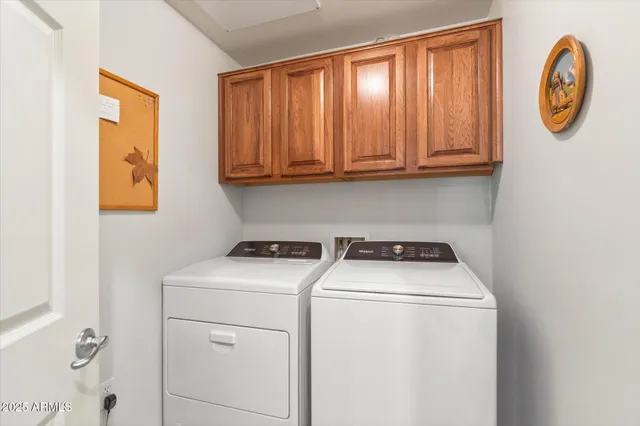 a bathroom with a toilet a sink and a mirror