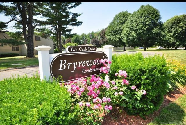 a sign on the side of the park