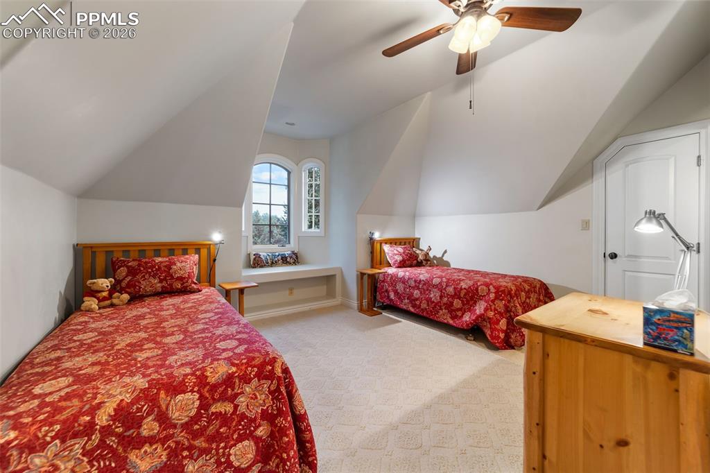 4450 Abert Ridge View Colorado Springs, CO 80908 - Photo 30 of 50 a bedroom with a bed and window