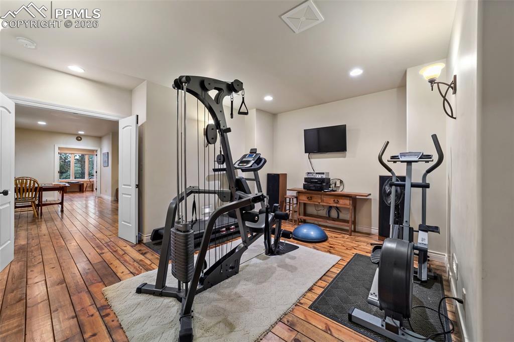 4450 Abert Ridge View Colorado Springs, CO 80908 - Photo 39 of 50 a view of a room with gym equipment
