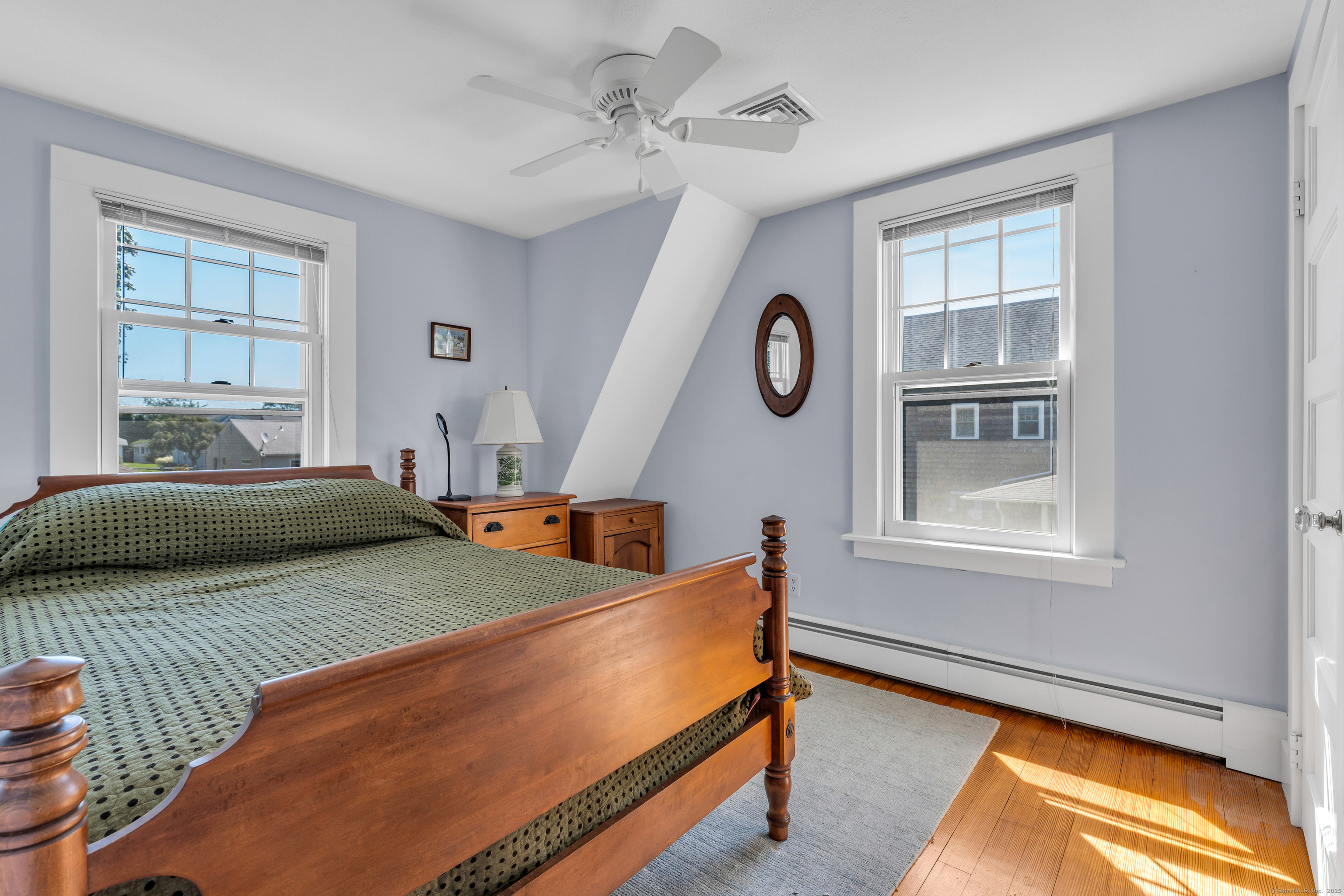 27 Ridgewood Avenue Madison, CT 06443 - Photo 13 of 31 a bedroom with bed and a window