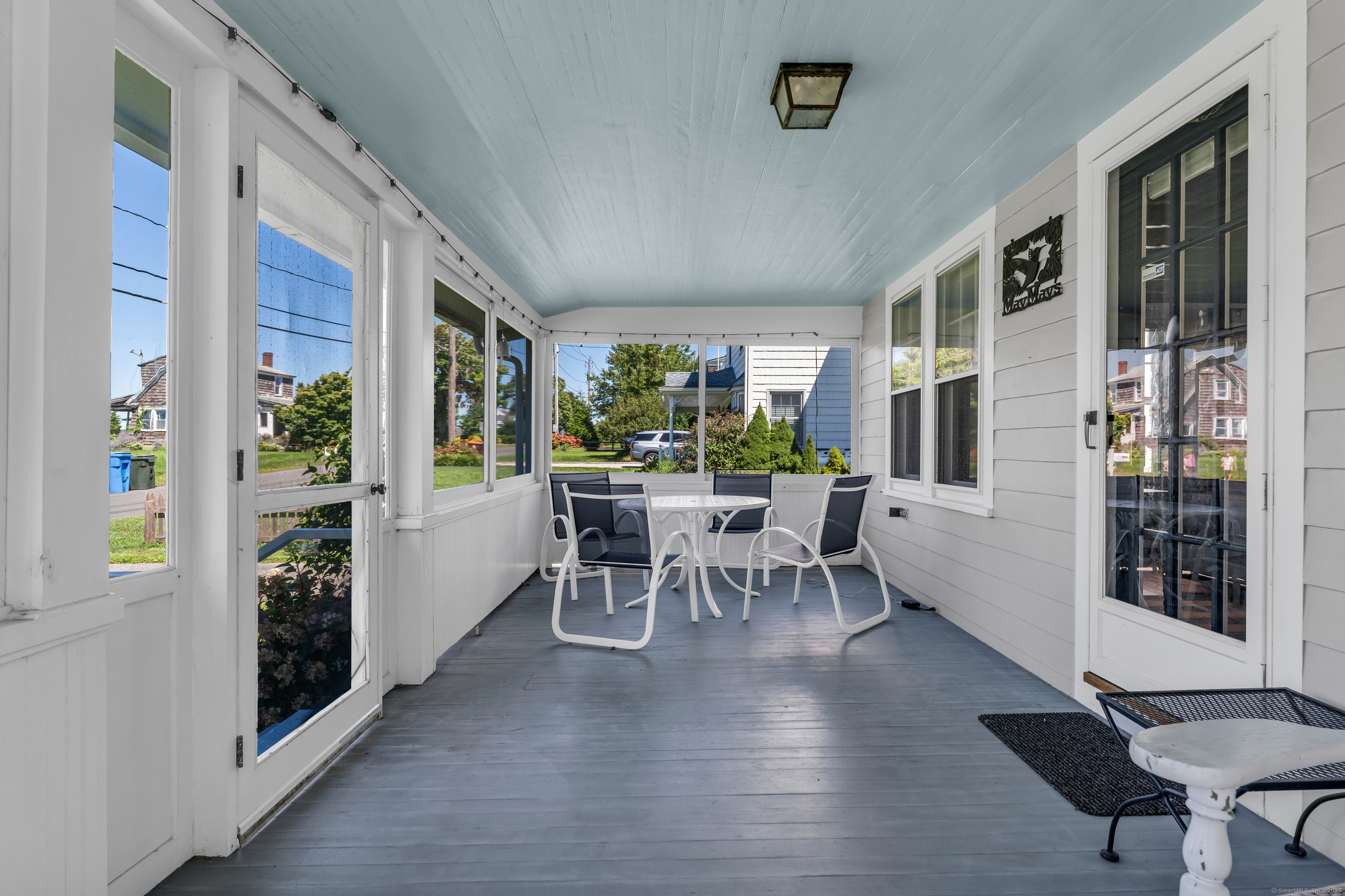 27 Ridgewood Avenue Madison, CT 06443 - Photo 23 of 31 The screened in front porch.