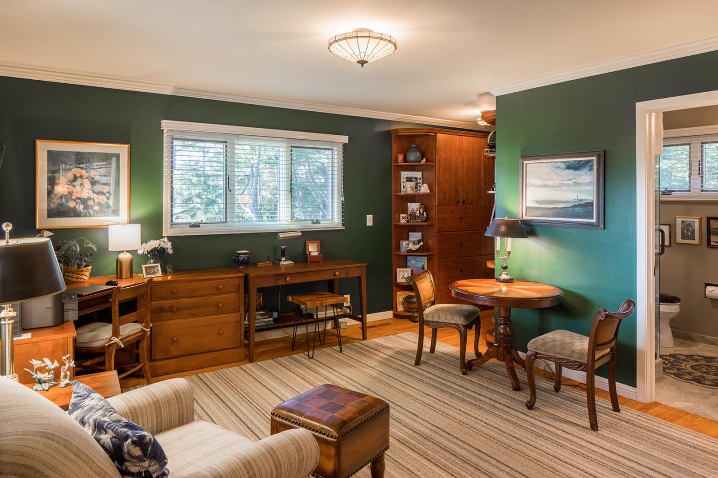 4117 Sunridge Road Pebble Beach, CA 93953 - Photo 16 of 30 a living room with furniture and a window