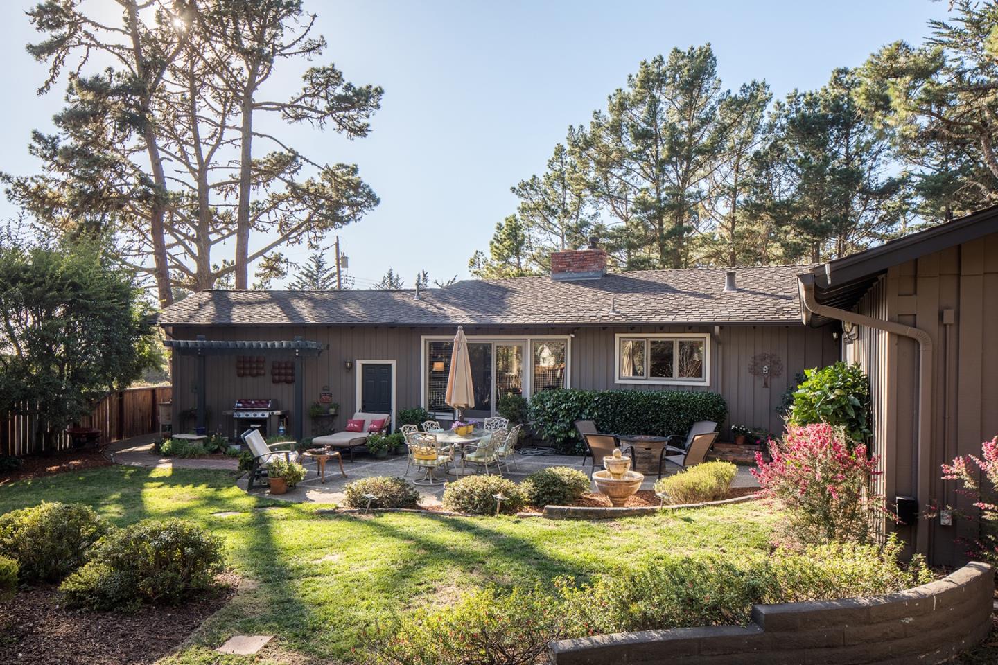 4117 Sunridge Road Pebble Beach, CA 93953 - Photo 20 of 30 a view of a house with swimming pool and furniture