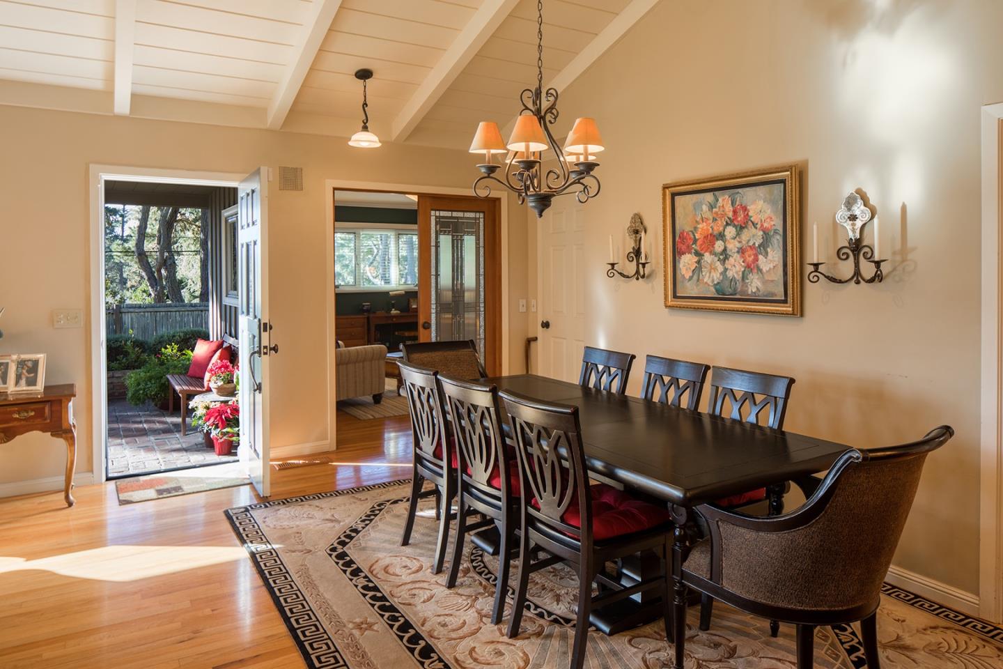 4117 Sunridge Road Pebble Beach, CA 93953 - Photo 4 of 30 a view of a dining room with furniture and a chandelier