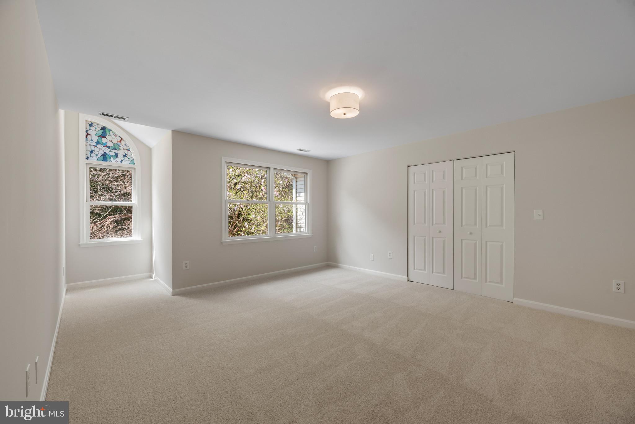 5929 Deale Beach Road Deale, MD 20751 - Photo 38 of 58 Unfurnished bedroom with light colored carpet and
