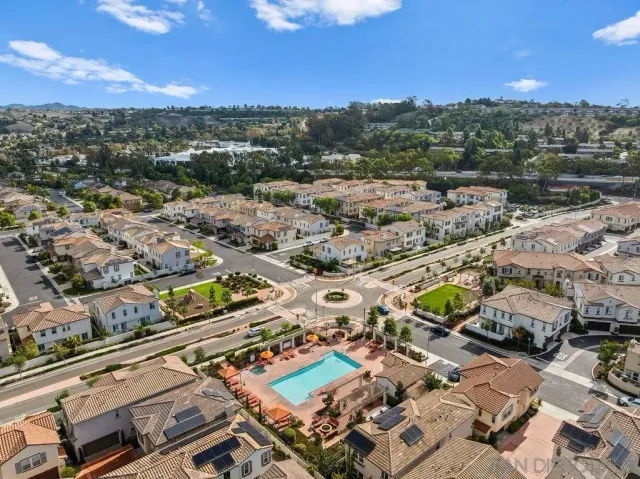 a view of a building with a swimming pool