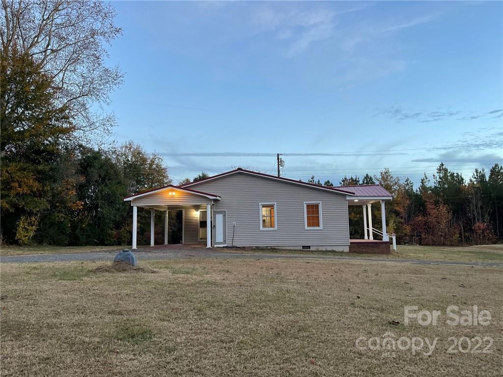 689 Whiteside Road Rutherfordton, NC 28139 - Photo 3 of 41 a front view of a house with a yard