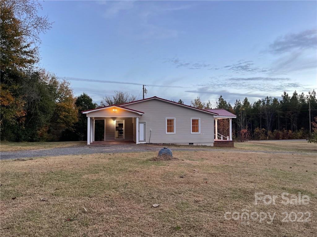 689 Whiteside Road Rutherfordton, NC 28139 - Photo 4 of 41 a house with trees in the background