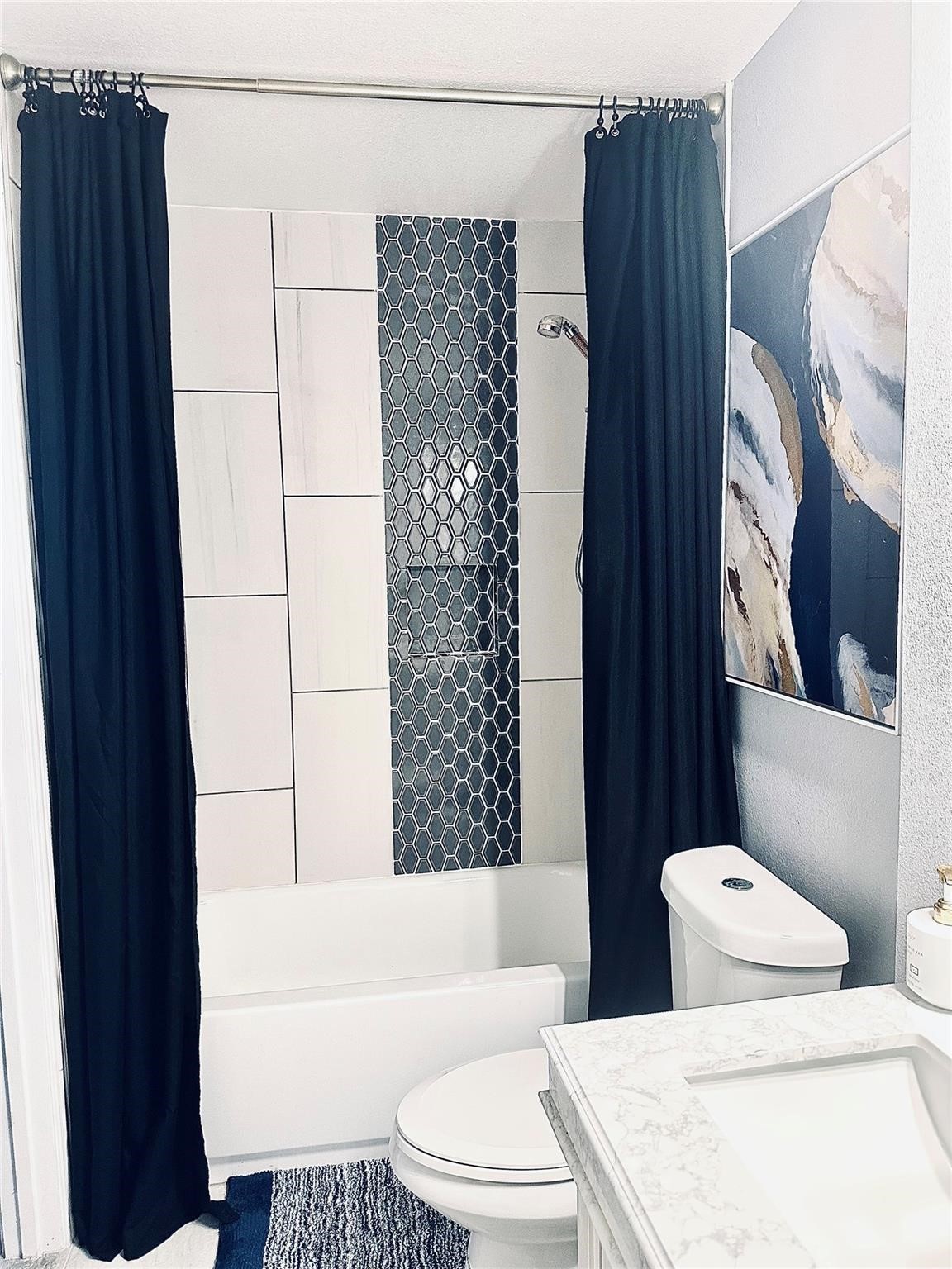 1457 Camellia Street Sweeny, TX 77480 - Photo 23 of 29 a bathroom with a toilet and a shower curtain