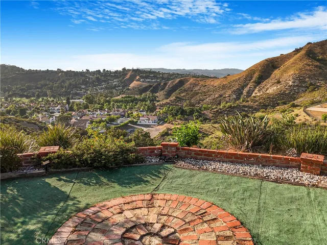 a view of a room with lots of gym equipment