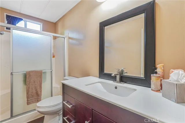 a view of a backyard with potted plants