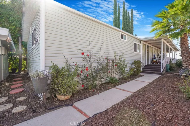 a view of a swimming pool with an outdoor seating