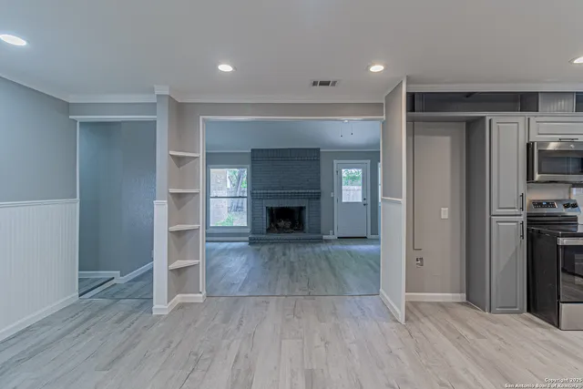 a view of a livingroom with a fireplace