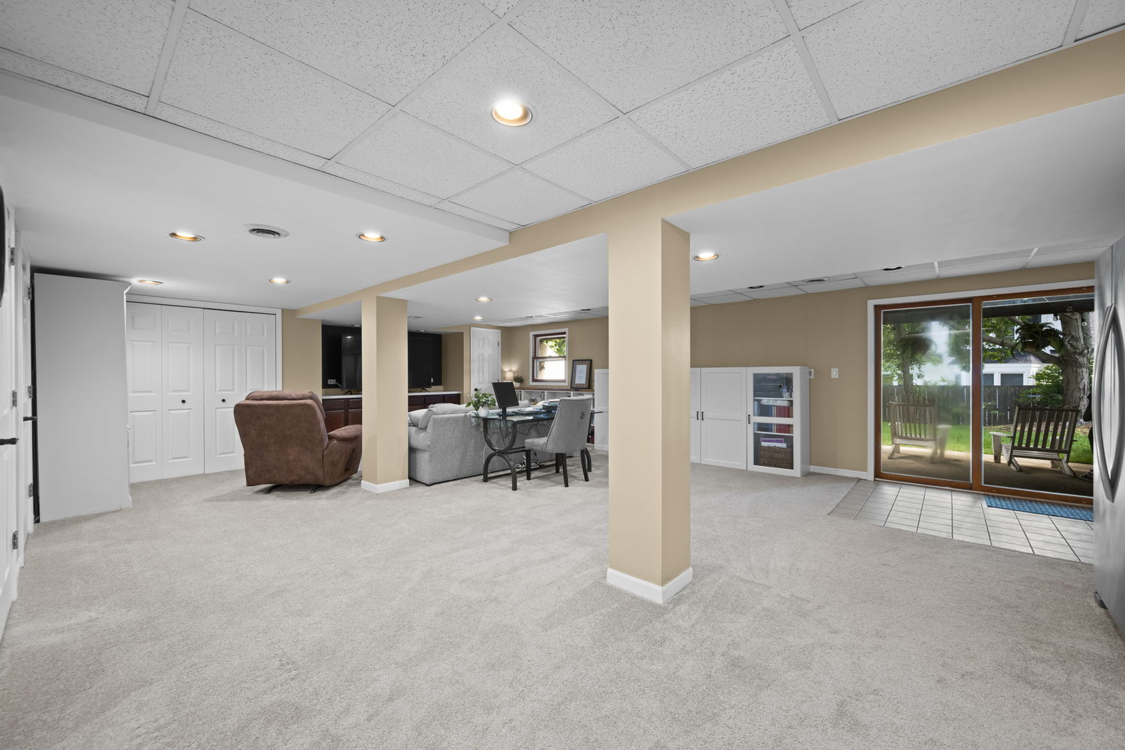 1565 Freeman Road Hoffman Estates, IL 60192 - Photo 34 of 46 a room with furniture and a large window