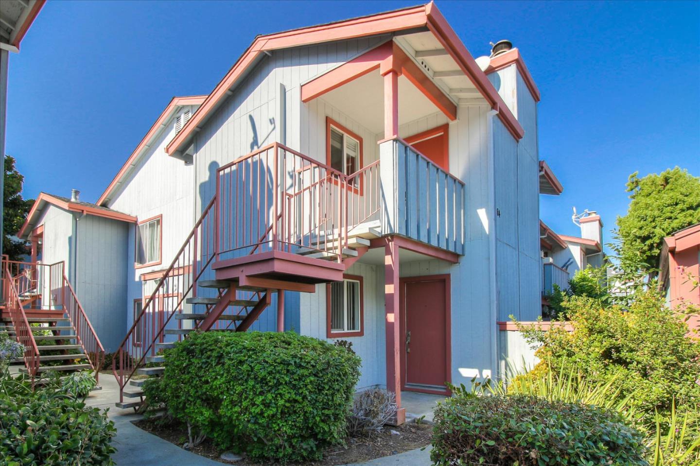 84 Rancho Drive, Unit H San Jose, CA 95111 - Photo 1 of 27 a view of a house with a small yard and plants