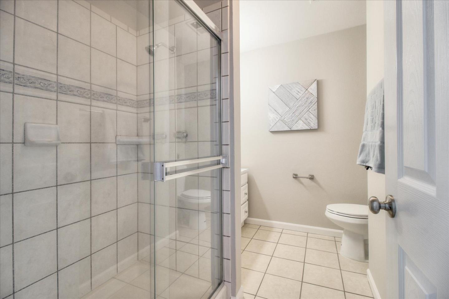 84 Rancho Drive, Unit H San Jose, CA 95111 - Photo 14 of 27 a bathroom with a toilet and a shower