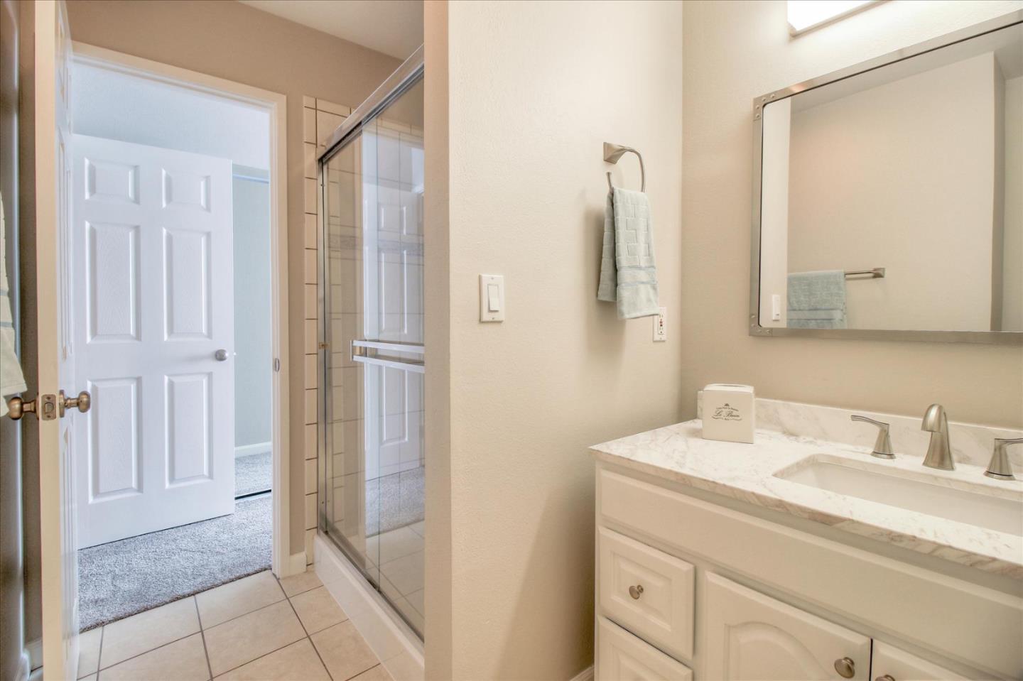84 Rancho Drive, Unit H San Jose, CA 95111 - Photo 16 of 27 a bathroom with a sink and a mirror