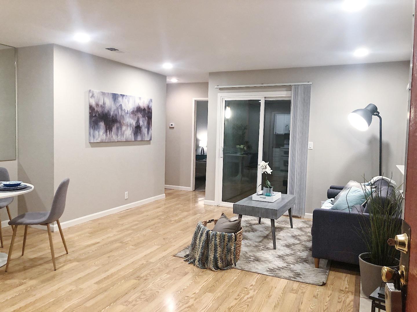 84 Rancho Drive, Unit H San Jose, CA 95111 - Photo 23 of 27 a living room with furniture and large window