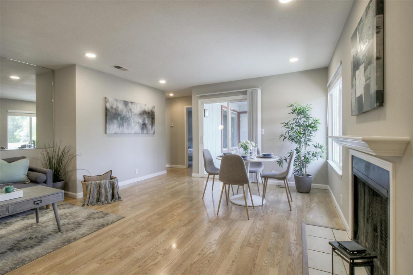 84 Rancho Drive, Unit H San Jose, CA 95111 - Photo 4 of 27 a view of a dining room with furniture window and wooden floor