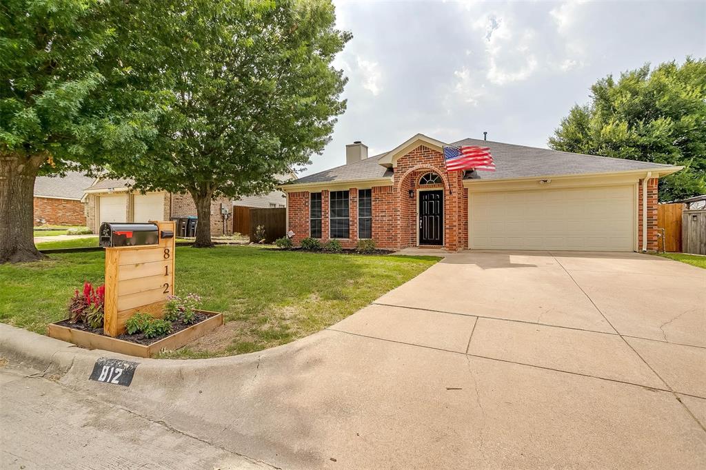 812 Voltamp Drive Fort Worth, TX 76108 - Photo 1 of 1 a front view of a house with a yard and trees