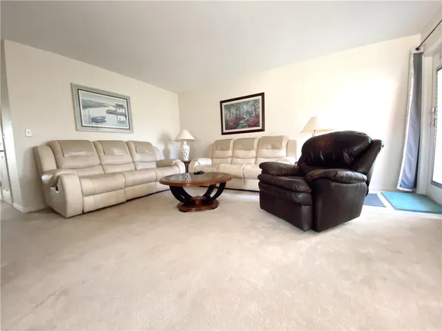 a kitchen with a sink a stove and refrigerator
