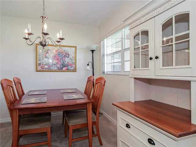 a bedroom with a bed and flat screen tv