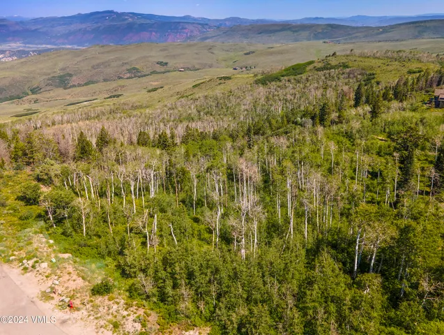 a view of mountain with an outdoor space