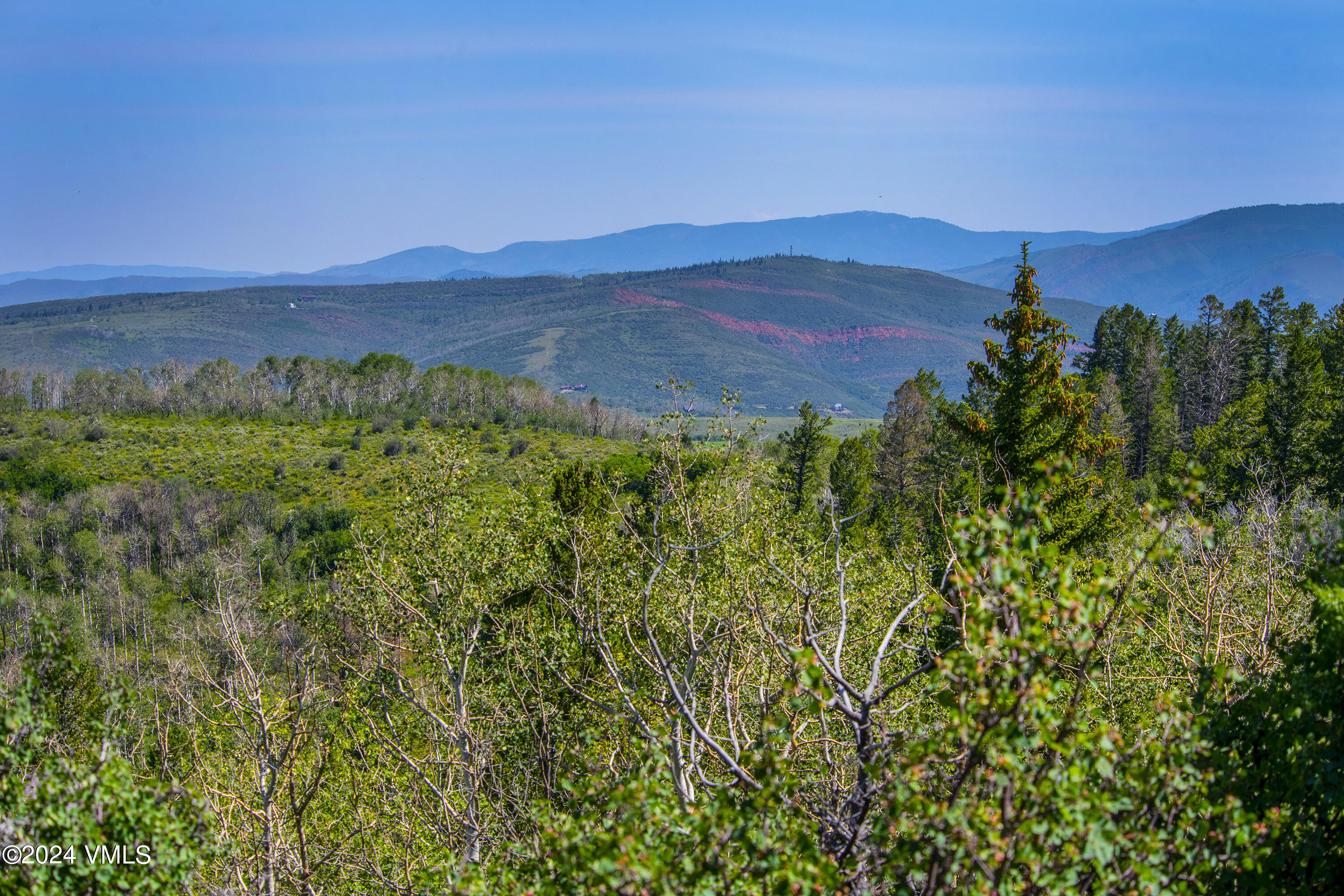 907 Webb Peak Edwards, CO 81632 - Photo 3 of 17 a view of mountain with sunset in background