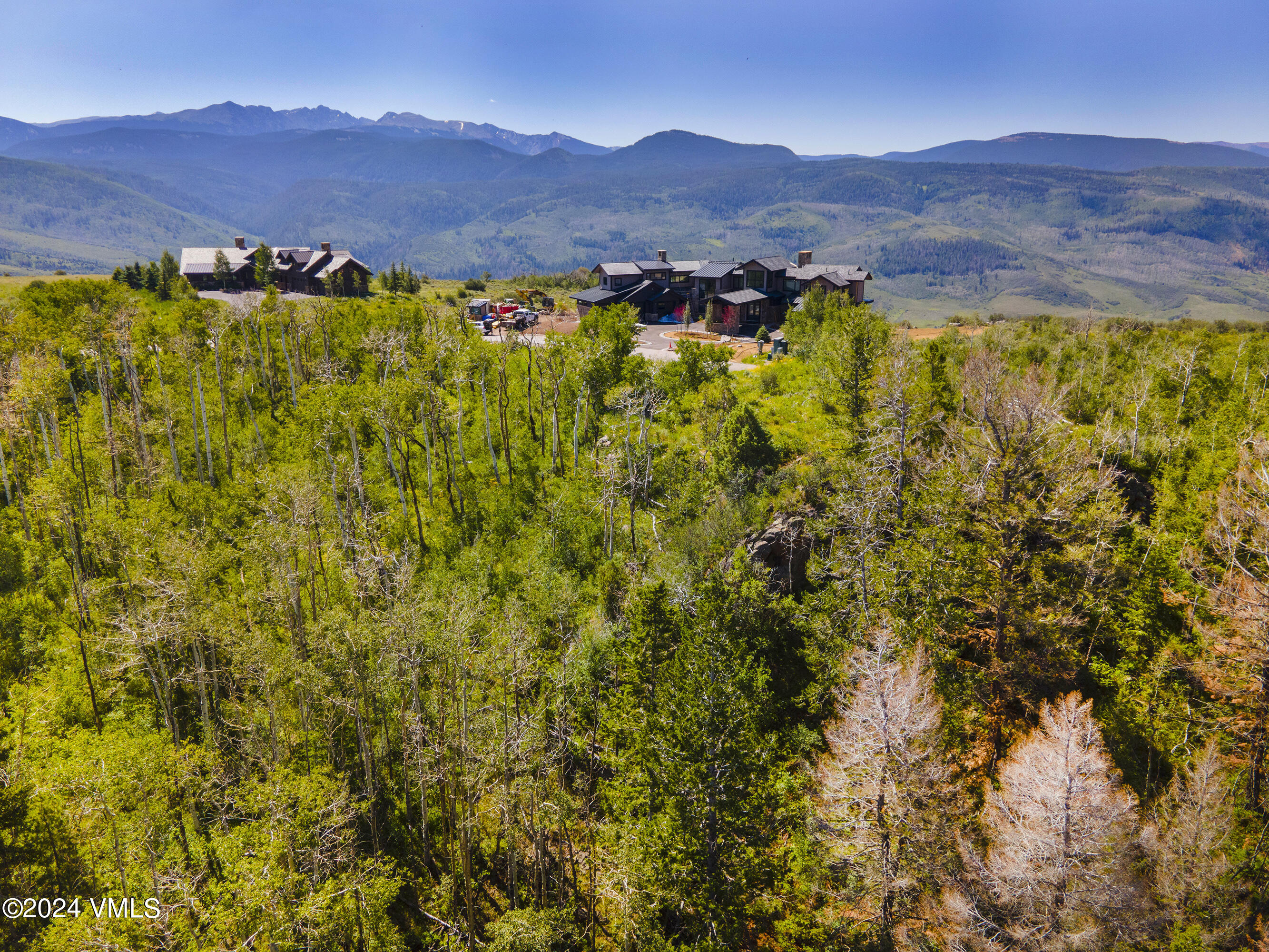 907 Webb Peak Edwards, CO 81632 - Photo 6 of 17 a view of a lush green hillside and houses