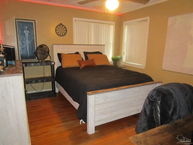 a bed room with a bed and a couch