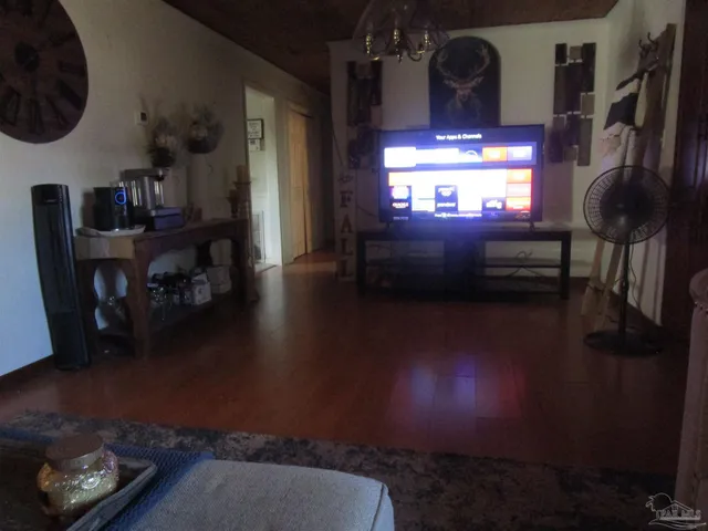 a view of a livingroom with furniture and a fireplace