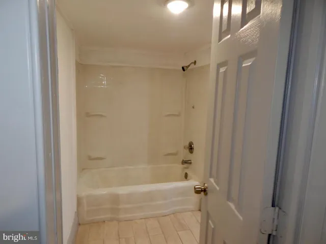 a bathroom with a bathtub